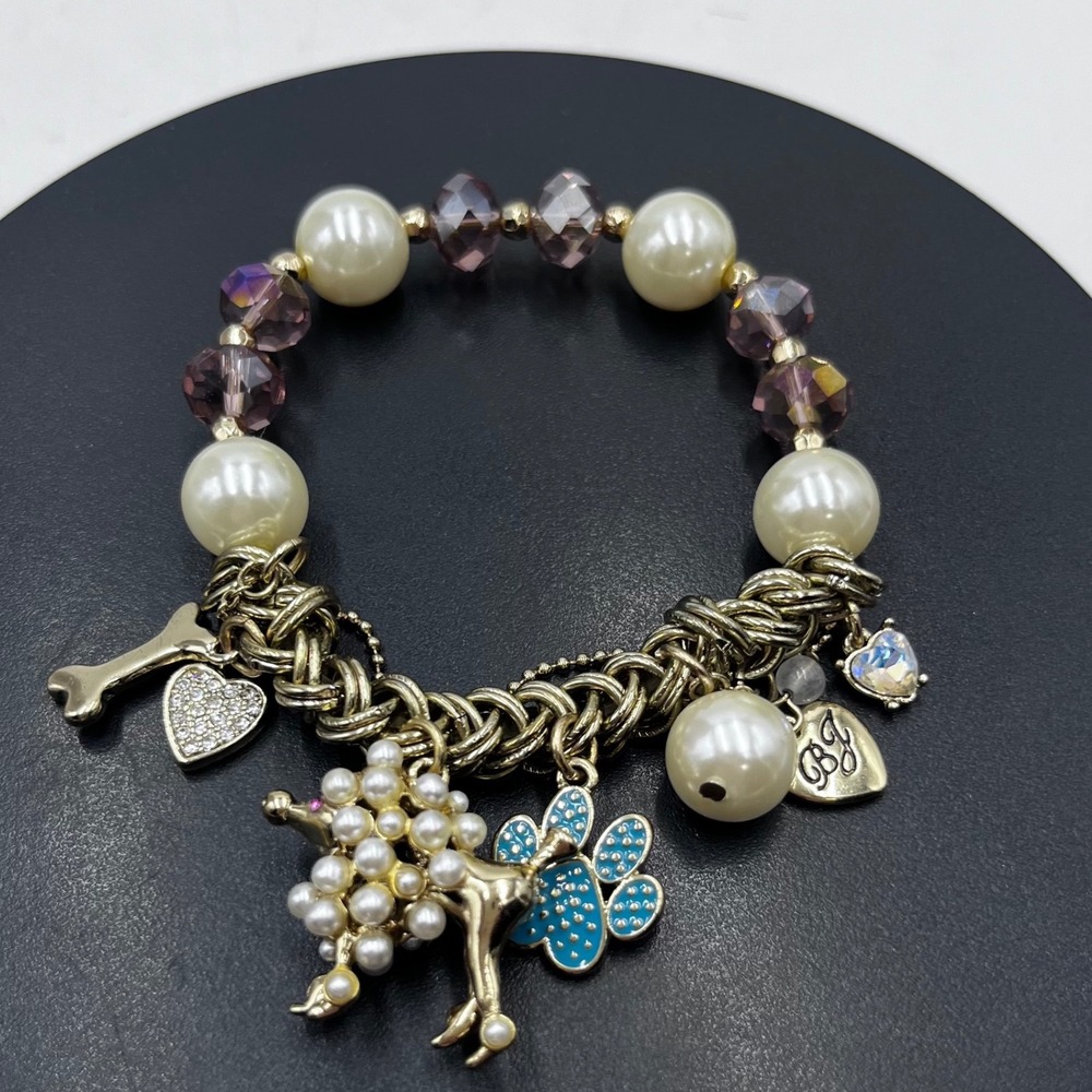Betsey Johnson Pearl Poodle Dog, Blue Enameled Bone Beads
Stretch Charm Bracelet